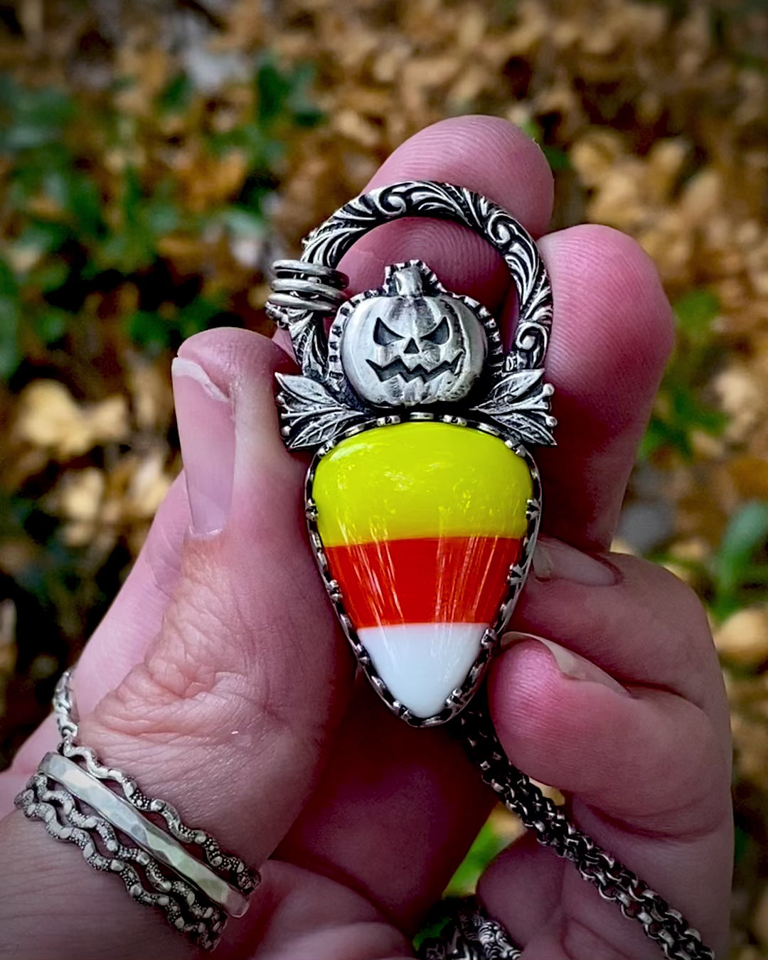 Load and play video in Gallery viewer, Sterling Pumpkin Candy Corn Pendant
