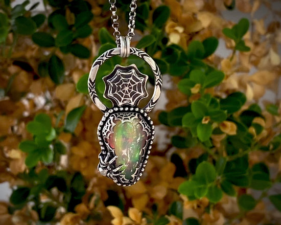 Load and play video in Gallery viewer, Spider Web Aurora Opal Coffin Pendant
