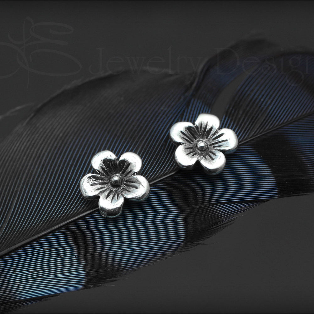 
                  
                    Sterling Silver Flower Studs - LE Jewelry Designs
                  
                