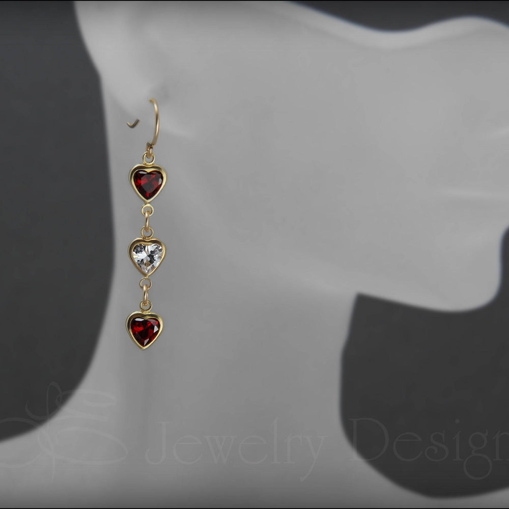 
                  
                    Triple Heart Dangle Earrings - (yellow or rose gold-filled) - LE Jewelry Designs
                  
                