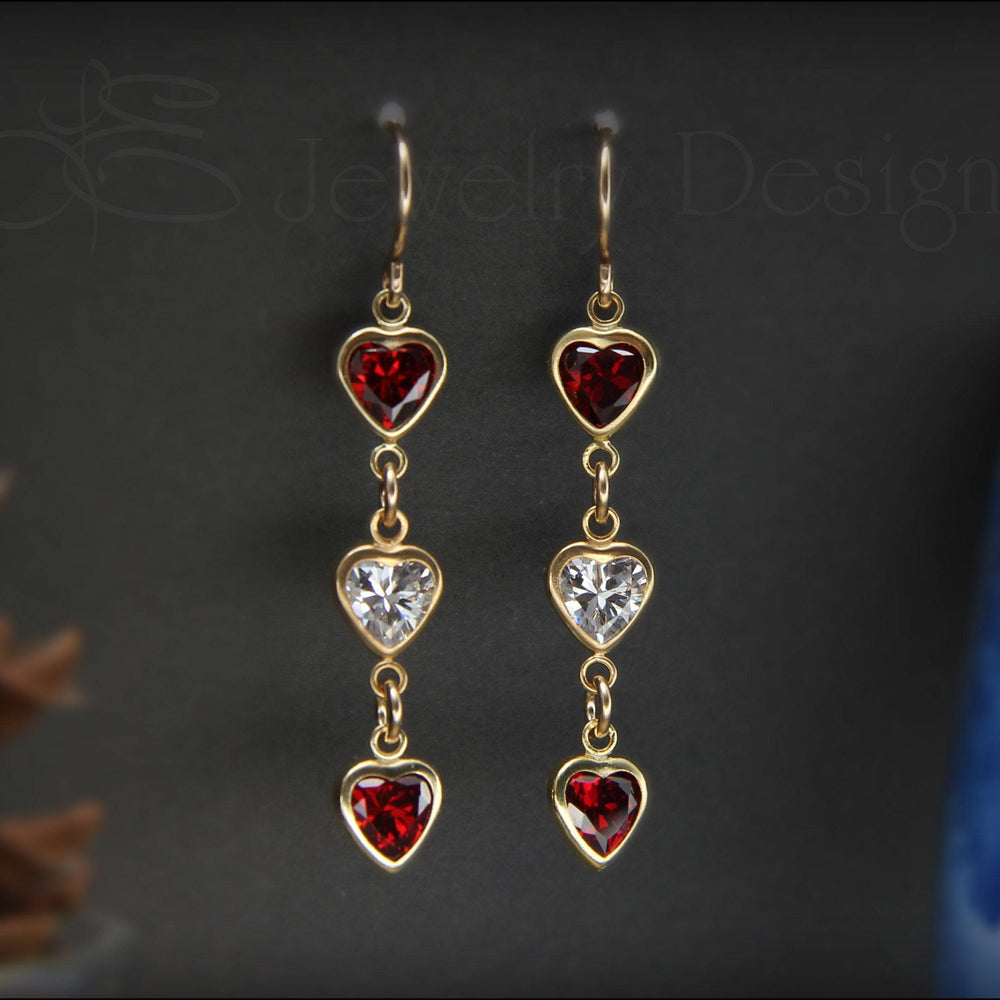 
                  
                    Triple Heart Dangle Earrings - (yellow or rose gold-filled) - LE Jewelry Designs
                  
                