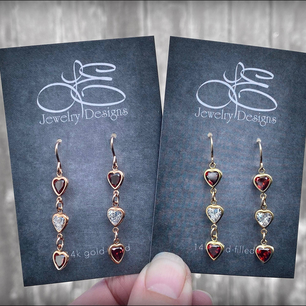 
                  
                    Triple Heart Dangle Earrings - (yellow or rose gold-filled) - LE Jewelry Designs
                  
                