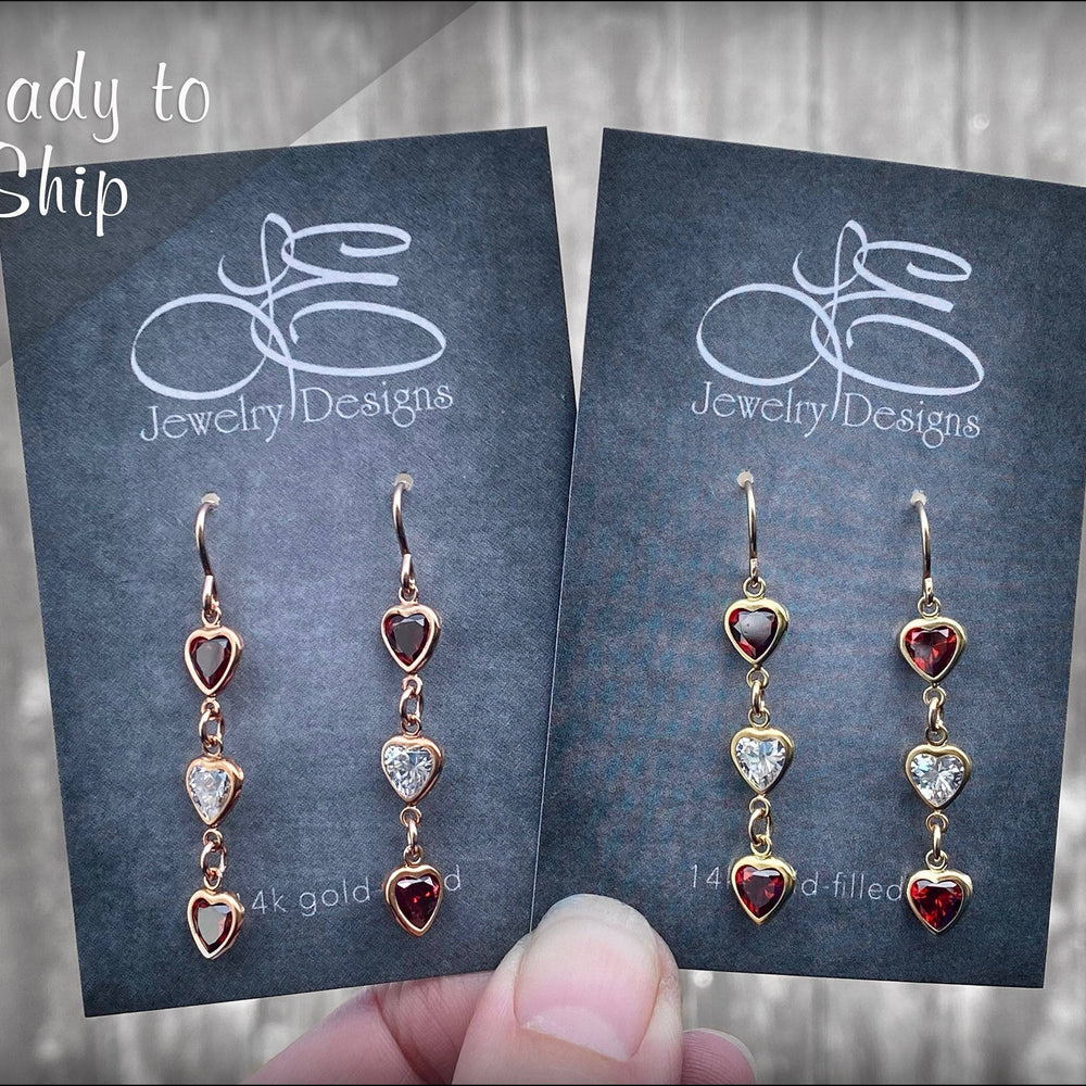 
                  
                    Triple Heart Dangle Earrings - (yellow or rose gold-filled) - LE Jewelry Designs
                  
                